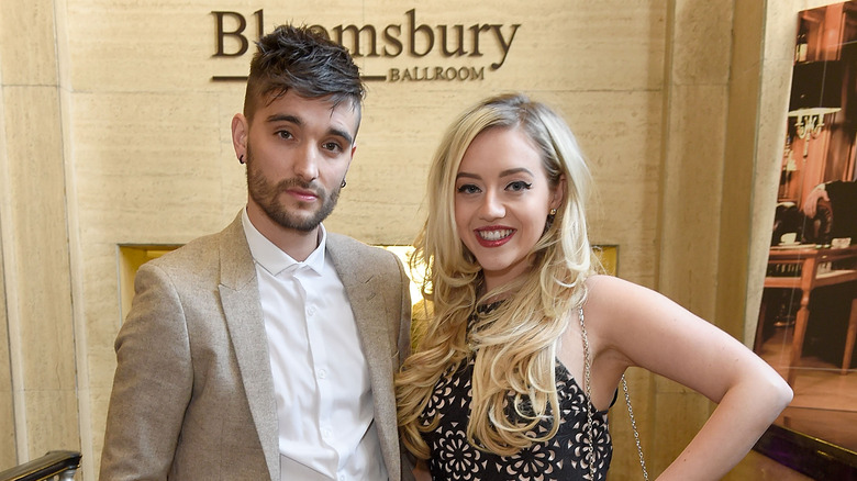 Tom Parker and Kelly Parker pose