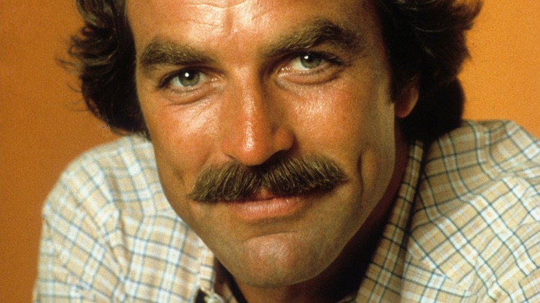 Tom Selleck smiling with mustache