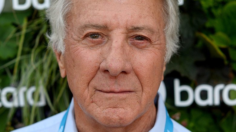 Dustin Hoffman looks at camera