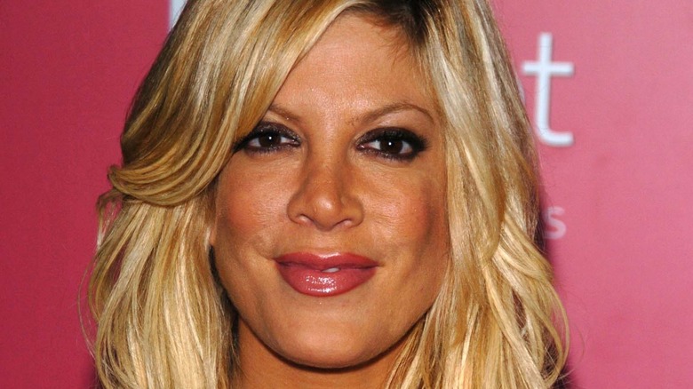 Tori Spelling in dark eye makeup