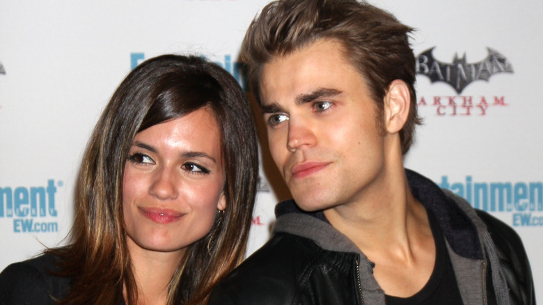 Torrey DeVitto and Paul Wesley on the red carpet