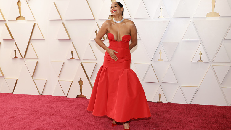 Tracee Ellis Ross smiling big and posing on the red carpet