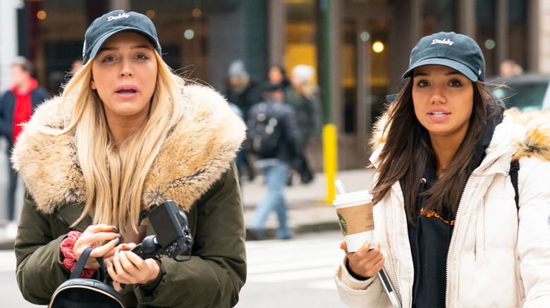 Alex Cooper and Sofia Franklyn walking