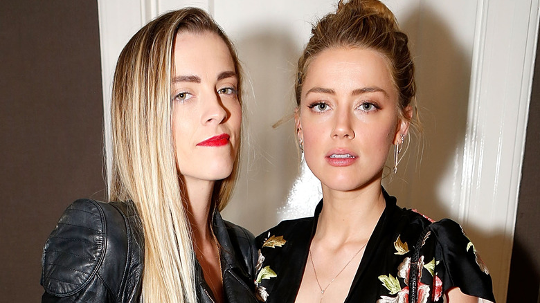 Whitney Henriquez and Amber Heard posing together