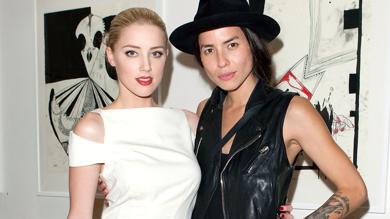 Amber Heard and Tasya van Ree posing together