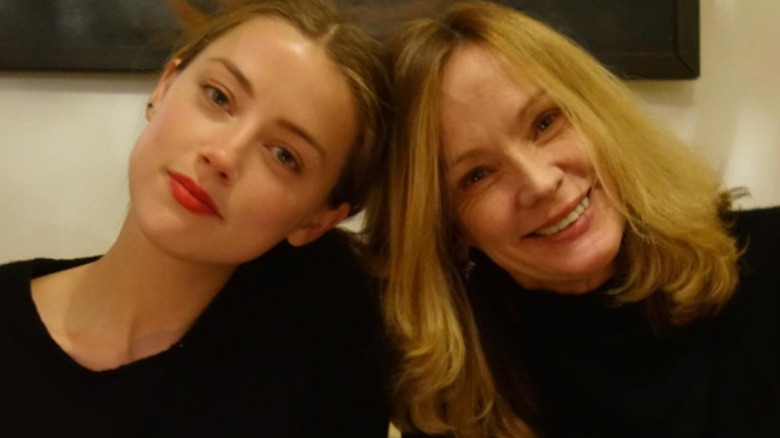 Amber Heard and her mom smiling 