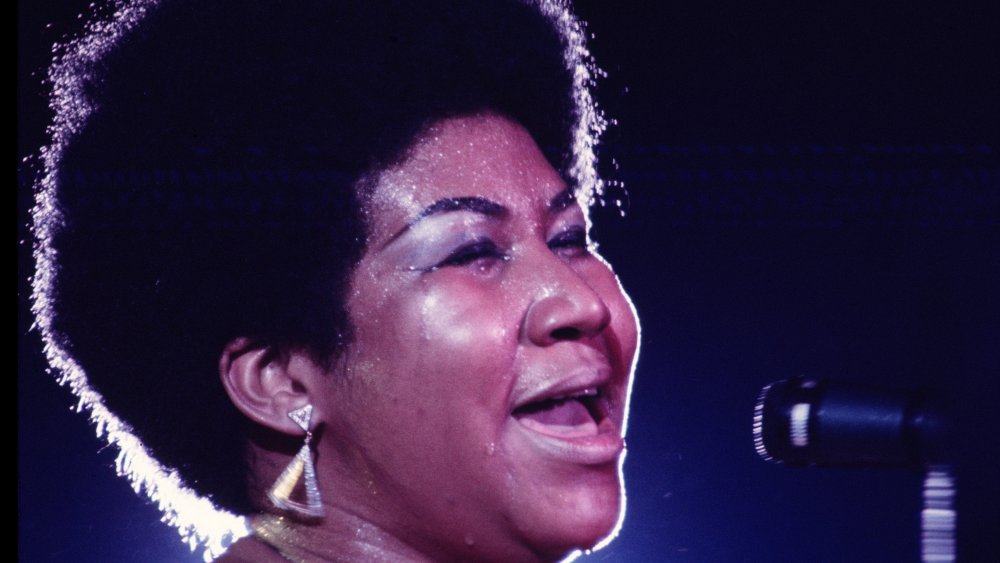 Aretha Franklin performing on stage