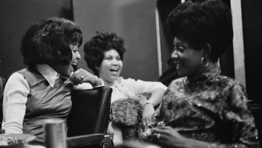 Aretha, Erma and Carolyn Franklin all laughing