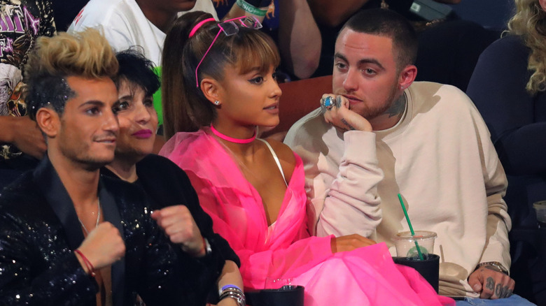 Frankie and Ariana Grande seated beside Mac Miller