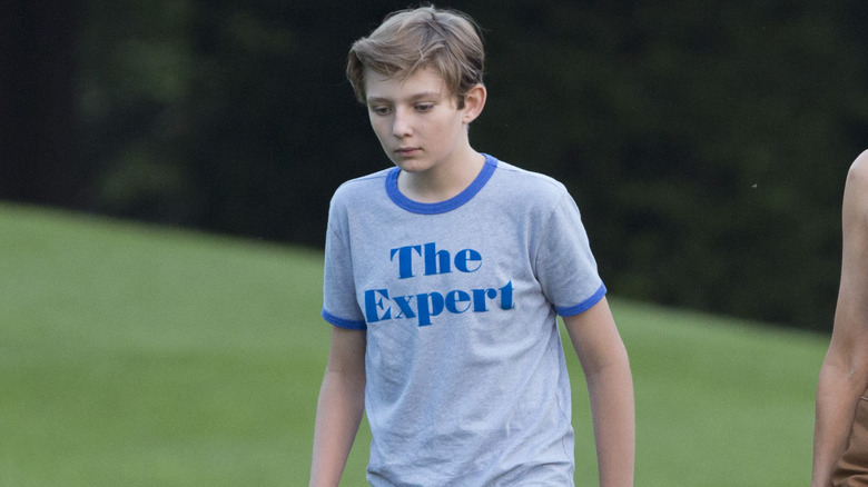 Barron Trump walking