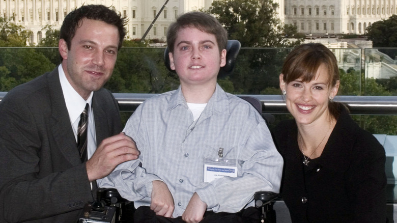 Joe Kindregan posing with Ben Affleck and Jennifer Garner 