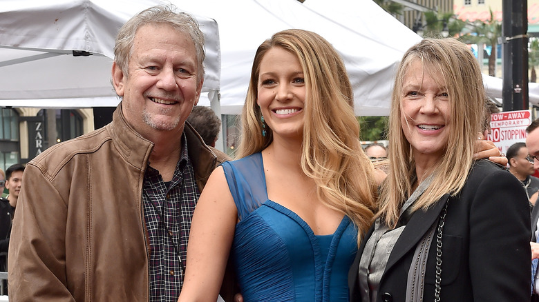 Blake Lively posing with parents