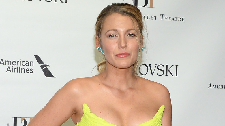 Blake Lively wearing yellow dress on red carpet