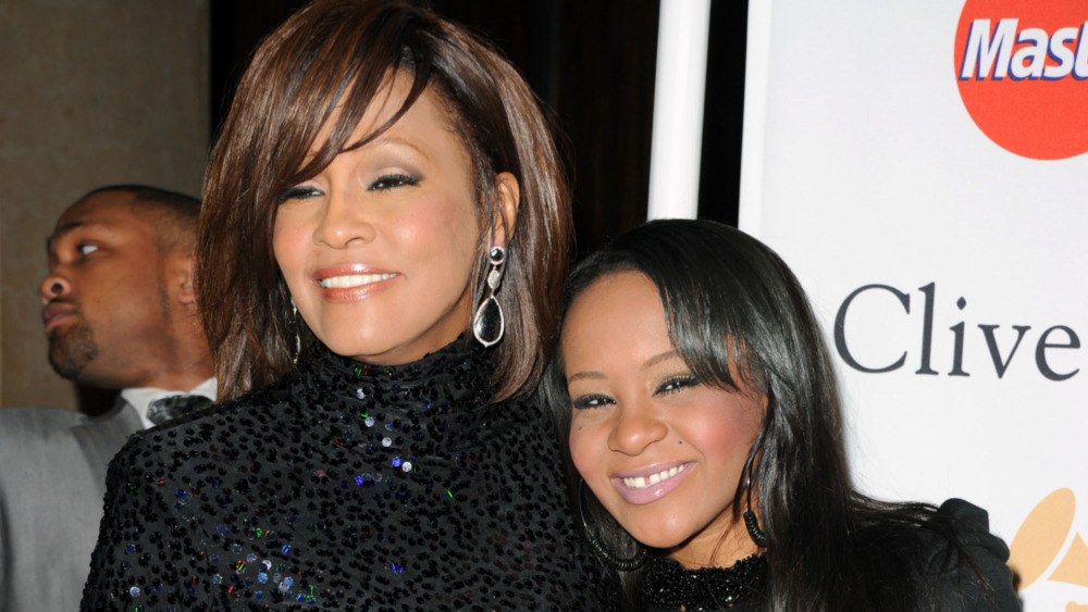 Whitney Houston and Bobby Kristina at an event