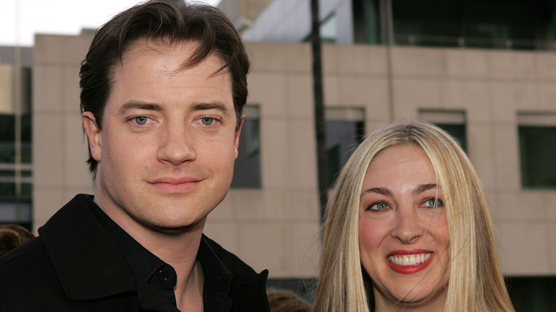 Brendan Fraser and Afton Smith posing together