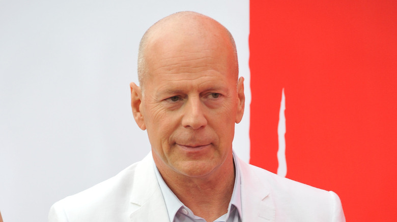 Bruce Willis in white suit