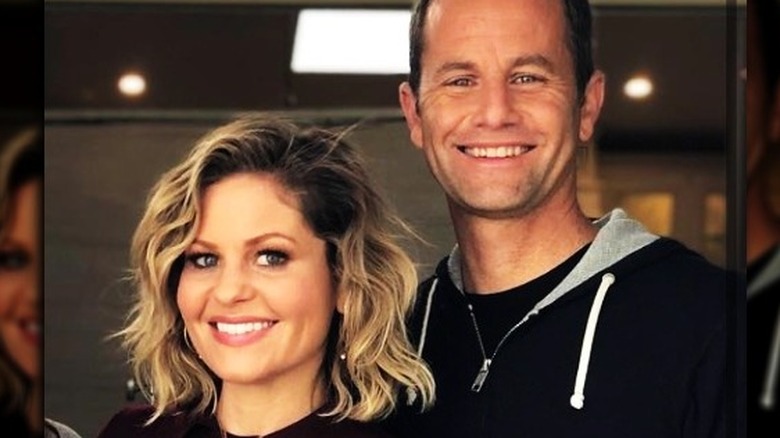 Candace Cameron Bure and Kirk Cameron posing together