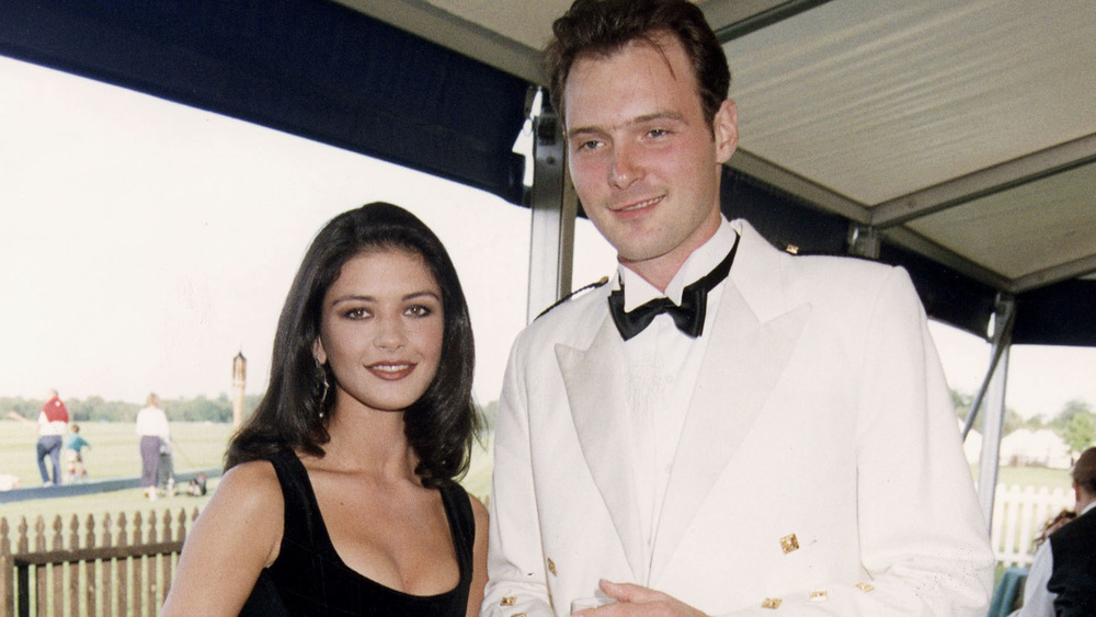 Catherine Zeta-Jones and John Leslie smiling