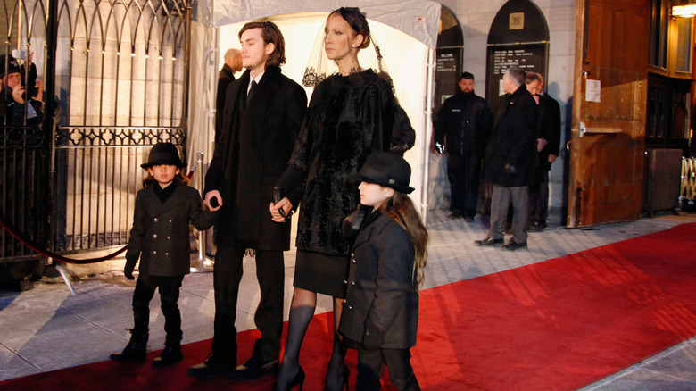 Celine Dion with her sons at René Angélil's funeral