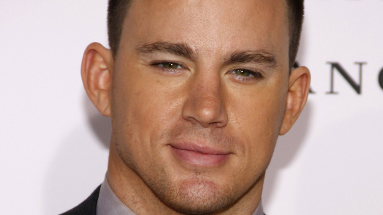 Channing Tatum smirks