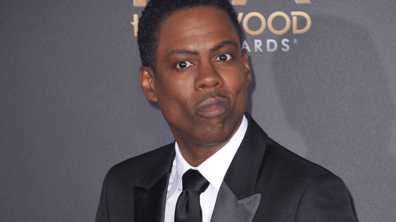 Chris Rock posing