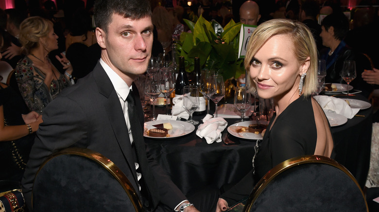 James Heerdegen and Christina Ricci at dinner table