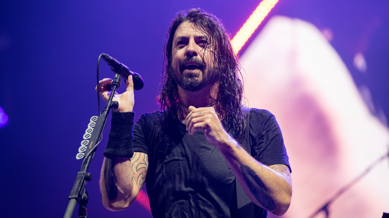 Dave Grohl holding a microphone