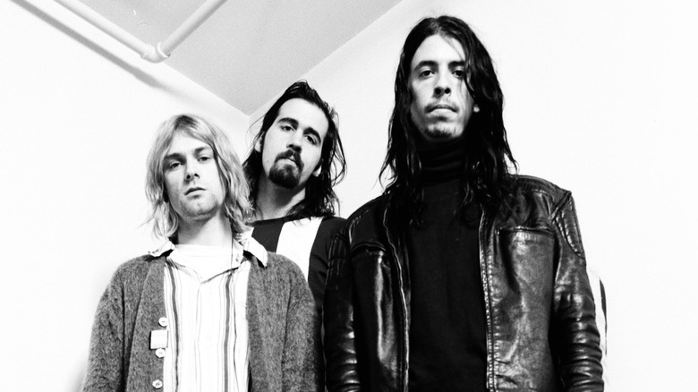 Nirvana posing in a black and white photo