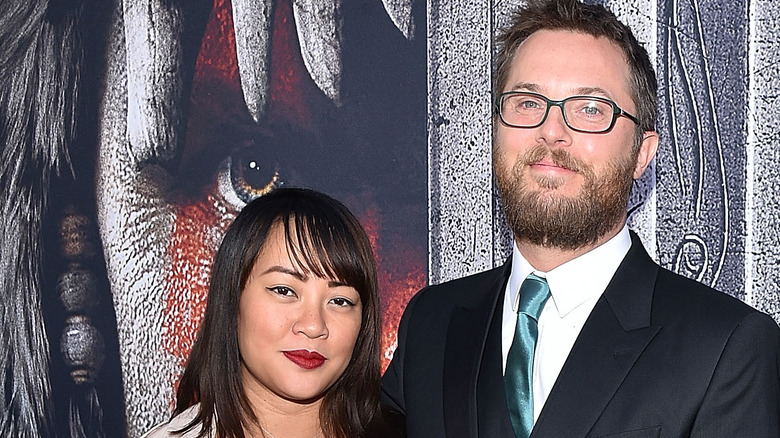 Duncan Jones, Rodene Ronquillo with Warcraft backdrop