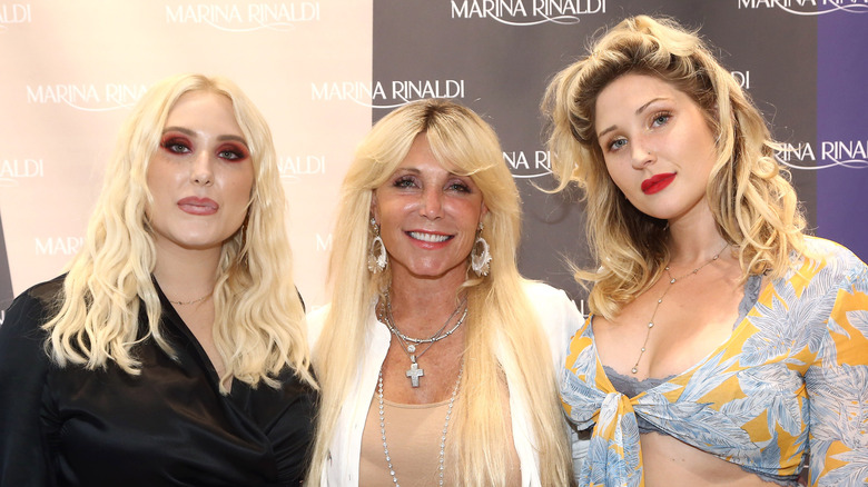 Hayley and Taylor Ann Hasselhoff posing with their mother Pamela Bach