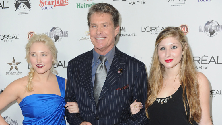 David Hasselhoff posing with his daughters