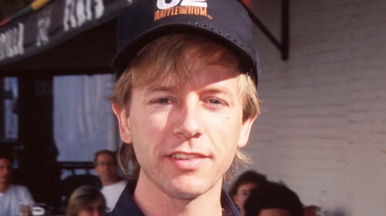 David Spade young in baseball cap