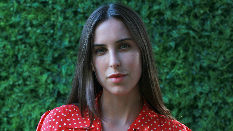 Scout Willis poses in red polka dot outfit