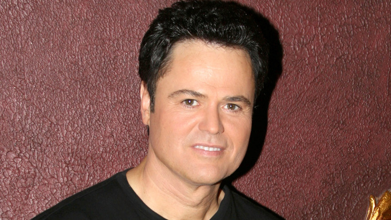 Donny Osmond posing for cameras