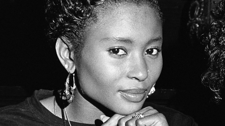 Dee Barnes looking at camera