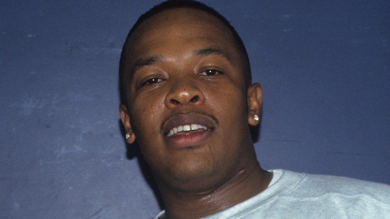 A young Dr. Dre smiling