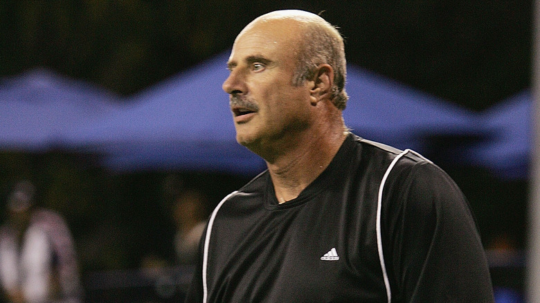 Dr. Phil on tennis court