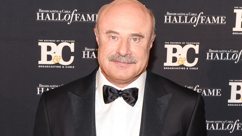Dr. Phil wearing tux on red carpet