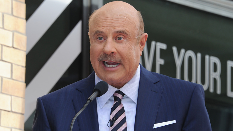Dr. Phil speaking on stage