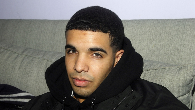 Young Drake wearing a black hoodie