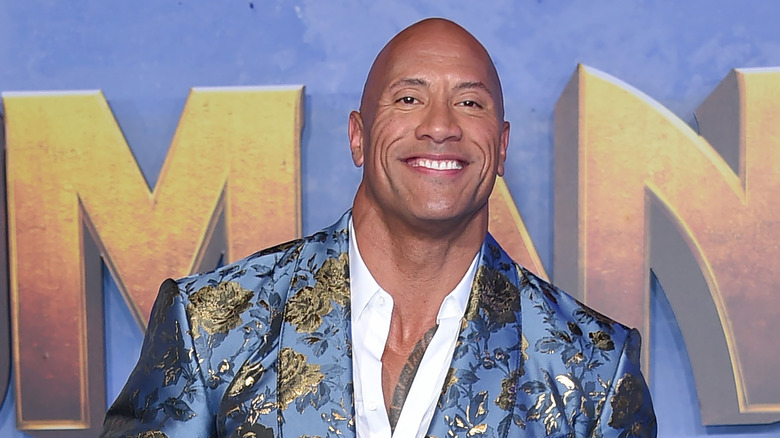 Dwayne Johnson smiles in 2019