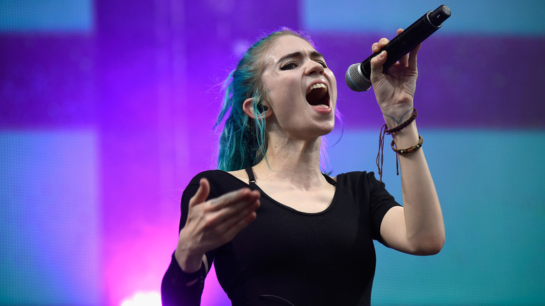 Grimes performing in 2014