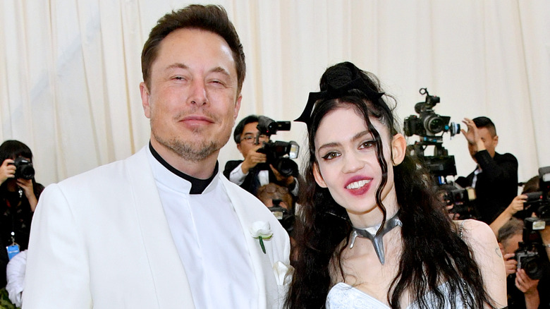 Elon Musk and Grimes pose at the 2018 Met Gala