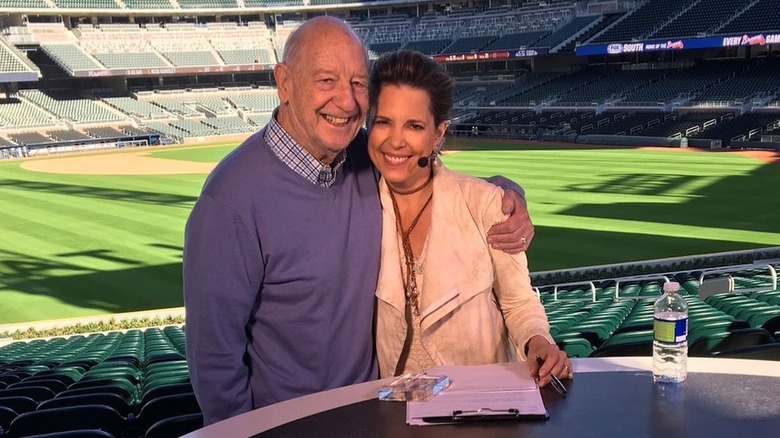 Hannah Storm with her dad behind the anchor desk