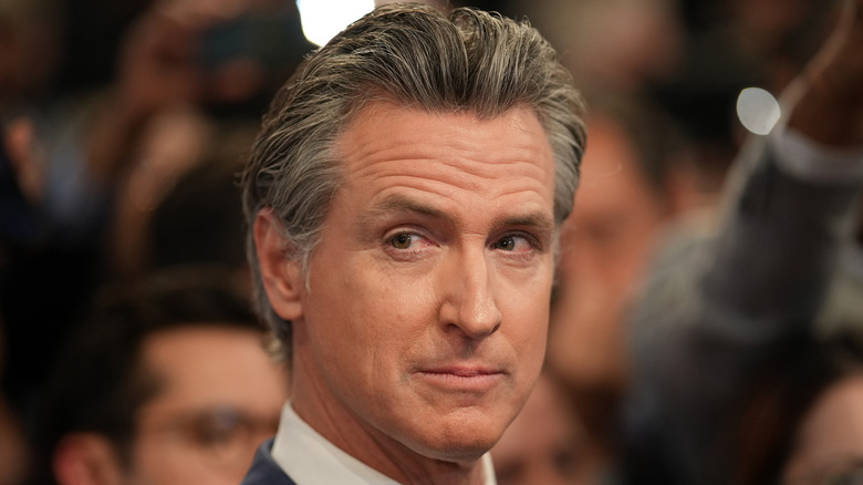 Gavin Newsom looks off to the side