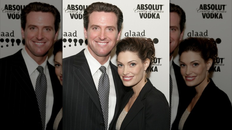 Gavin Newsom and Kimberly Guilfoyle on a red carpet