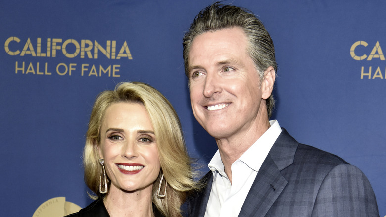 Jennifer Siebel and Gavin Newsom on a red carpet