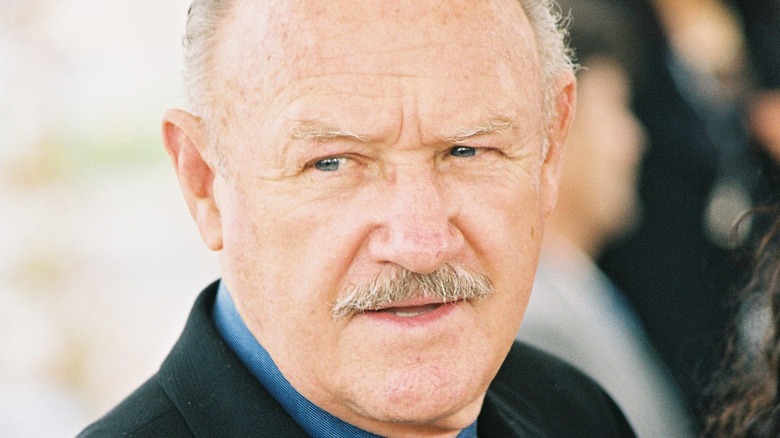 Gene Hackman smiling slightly 