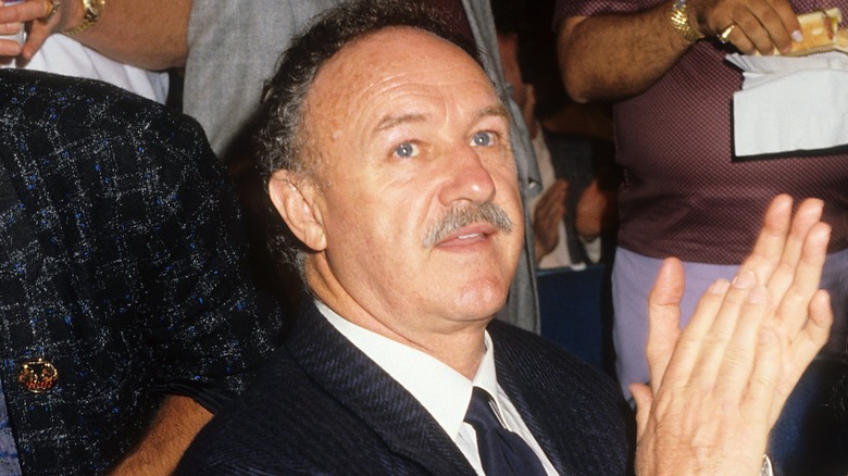 Gene Hackman applauding 