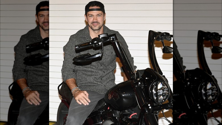 Ryan Paevey on motorcycle